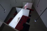 <p isrender="true">Cheng Ran, <em isrender="true">Before Falling Asleep - Video Installation</em>, 2015, mixed media (partition wall, carpet), 198 x 730 x 510 cm</p>
