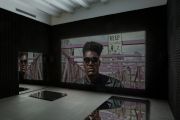 <p>Cheng Ran, <em isrender="true">Diary of a Madman - New York Installation</em>, 2016 - 2017 (Scenario 2 as shown at Galerie Urs Meile in Beijing), video installation (15 single channel HD video, color/sound, 16:9, TV-set, projector, speaker, mirror, black sound-absorbing cotton), dimension variable</p>
