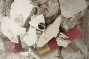 <p>Anatoly Shuravlev, <em>Panic evidence</em>, 2013, glass tube, plaster, empty cartridge cases, c-prints, 40.5 x &oslash; 21.5 cm, detail</p>
