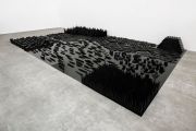 <p>Yang Mushi, <em>Grinding</em>, 2013 - 2016, wood, aluminum plate and black spray lacquer, 55 x 510 x 780 cm</p>
