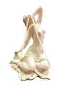 <p>Wiedemann/Mettler,&nbsp;<em>GLOWING HOPE 3,</em> 2024, arranged porcelain, fluorescent beads, 17 x 15 x 24 cm</p>
