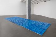 <p>Hu Qingyan, <em>Blue on the ground</em>, 2022, white marble, water paint, 749 &times; 272 x 6 cm&nbsp; (44 pieces, each 68 &times; 68 cm)</p>
