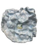 <p>Wiedemann/Mettler, <em>Repulse Bay Beach</em>, 2024, glazed ceramics, polaroid picture, ca. 42 x 42 x 12 cm</p>
