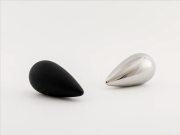 <p>Alice Wang, <em>Untitled</em>, 2023, stainless steel; matte black and mirror finish, two pieces; each in 12.71 x 12.71 x 24 cm</p>
