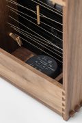 <p>Guo Tiantian, <em>Touching the Waves (Sound Box)</em>, 2025 - 2026, silk strings, reed, lacquerware, black walnut, wireless speaker, 3'50", 32 x 24 x 11.8 cm, detail</p>
