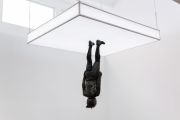 <p>Cheng Ran, <em isrender="true">The Ear Bums 1</em>, 2017, multi-media installation (light box, dummy, biker gear), 223 x 300 x 244 cm</p>
