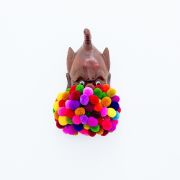 <p>Wiedemann/Mettler,&nbsp;<em>babble brabble,</em> 2012, japanese wooden mask, woolen pom poms, 20 x 28 x 12 cm</p>
