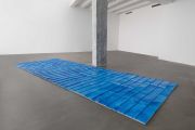 <p>Hu Qingyan, <em>Blue on the ground</em>, 2022, white marble, water paint, 749 &times; 272 x 6 cm&nbsp; (44 pieces, each 68 &times; 68 cm)</p>
