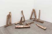 <p>Hu Qingyan, <em>Legs</em>, 2018, cast copper, 12 pieces (lengths vary from 60 to 95 cm), dimensions of the installation variable</p>
