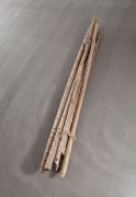 <p>Hu Qingyan, <em>A Bundle of Bamboo, No. 1</em>,&nbsp;2011, jinsi nanmu wood from an old house beam, hemp rope, 8 pcs, each &Oslash; 10-15 cm,&nbsp;length from 330 cm to 470 cm</p>
