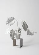 <p>Klodin Erb,&nbsp;<em>Plant's Life,</em> 2025, faux leather, plastic and side table, 97 x 131 x 102 cm</p>
