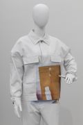 <p>Tobias Kaspar, <em>Extras </em>(detail), 2019, mannequins with different material, Tobias Kaspar x FFixxed Studios uniforms, a wooden bench, painted white, 40 x 40 x 200 cm (bench); mannequins: 180 cm (standing); 130 cm (seating)</p>

